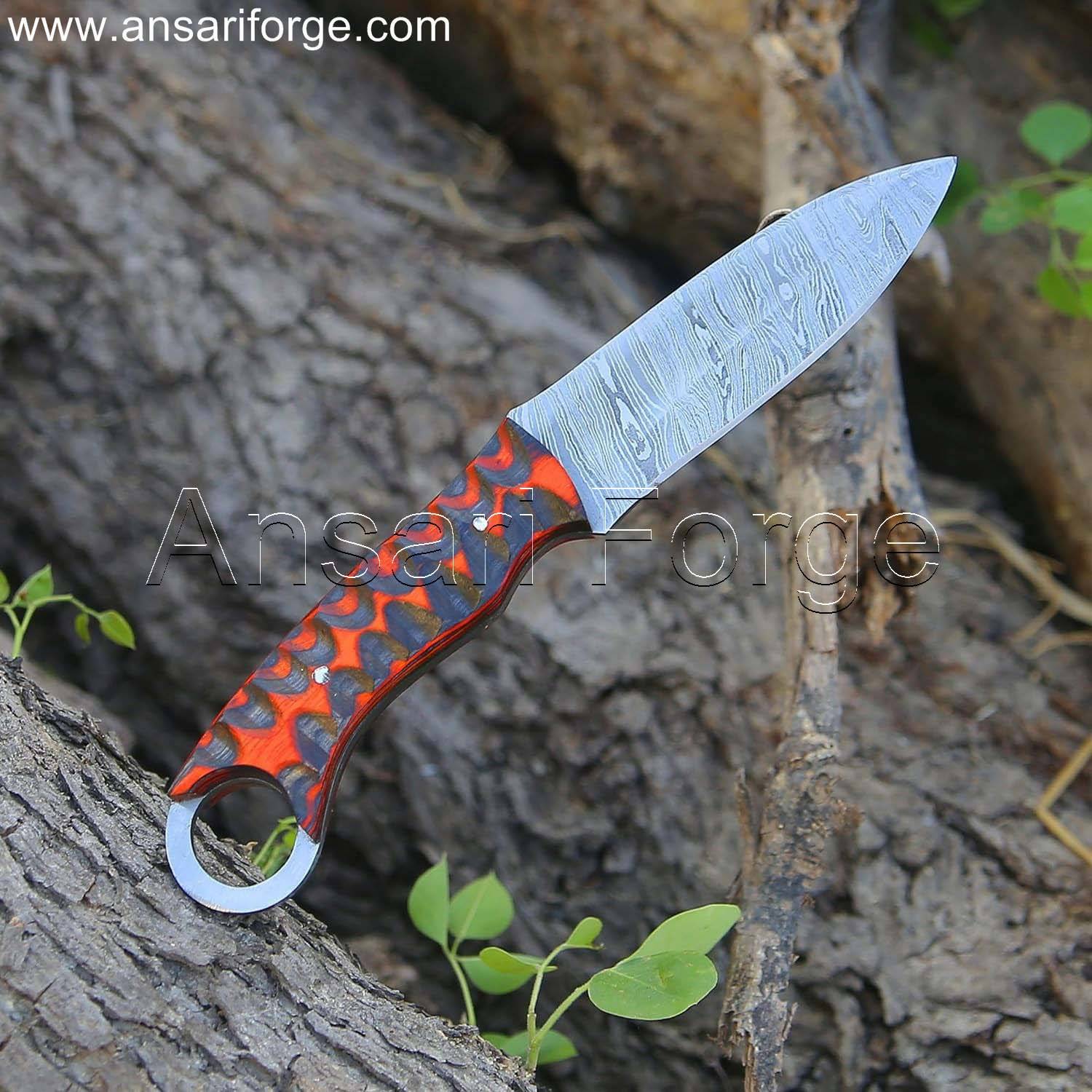 EDC fixed blade knife handle crafted from Pakkawood with finger hole for secure grip, displayed next to the genuine cowhide cross draw sheath.