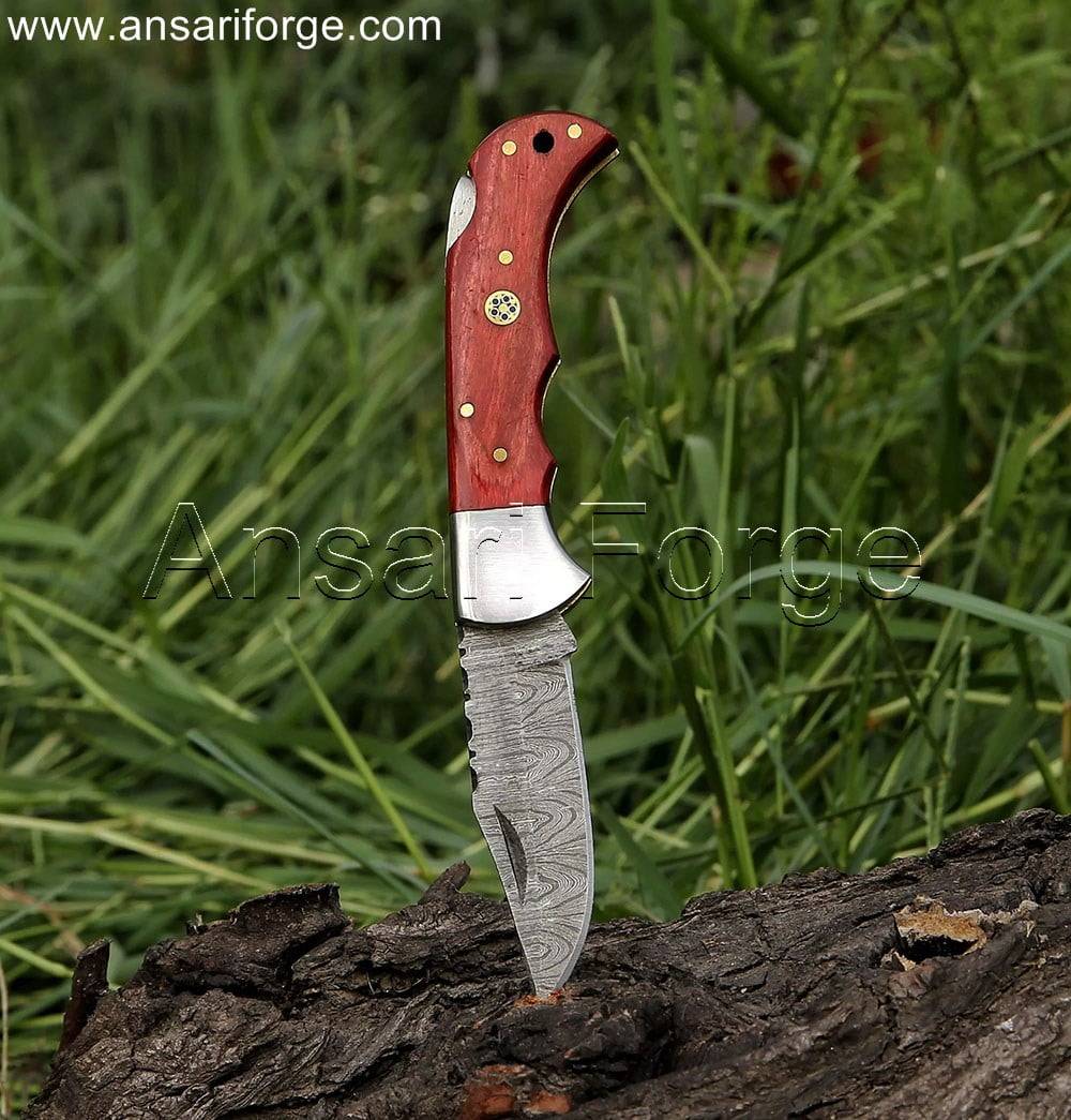 Hand-forged Damascus steel (1095 & 15n20) pocket knife with a captivating twist pattern, comfortable red pakkawood handle, and a stylish genuine cowhide leather sheath for secure carry.