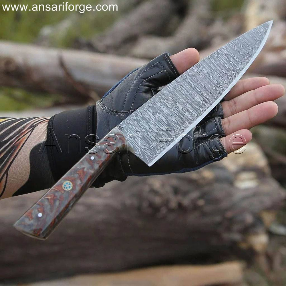 Sharp Damascus chef knife with a ladder pattern, pine cone handle, and leather sheath.