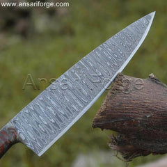 Damascus chef knife with beautiful layered blade pattern, pine cone wood handle, and brown cowhide leather sheath.