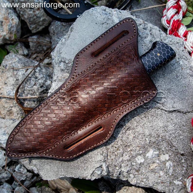 Best Damascus Skinning Knife with sheath - Features the knife securely positioned in the included cowhide leather cross draw horizontal sheath.