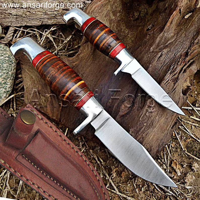 Hand-forged and handmade craftsmanship of the Hunting Knife Set, showcasing the detailed work on the blades and handles.
