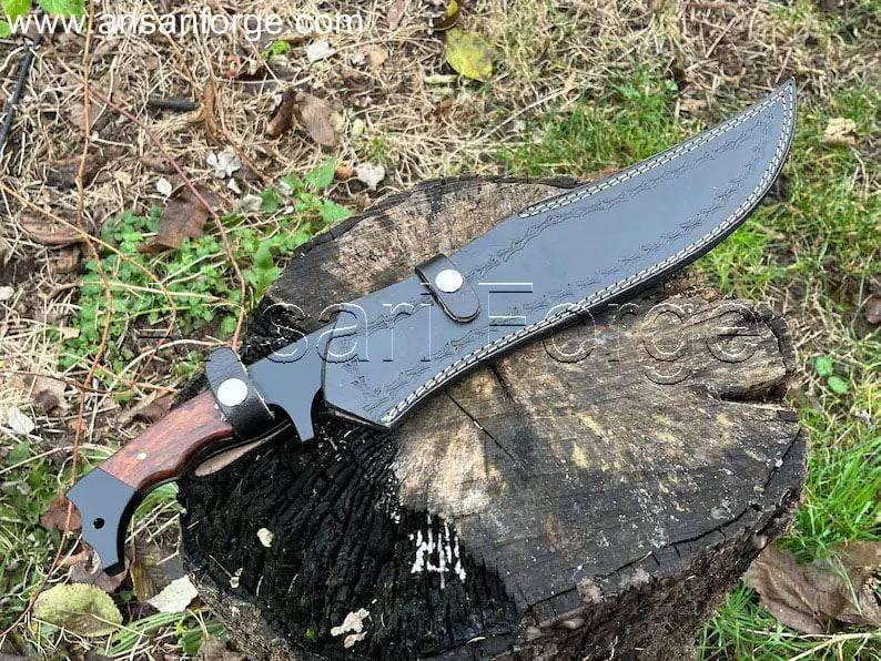 The Jim Black bowie knife secured in its genuine cowhide leather sheath.