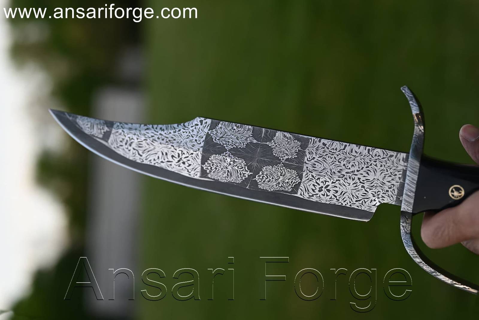 Mosaic Damascus Bowie Knife with beautiful Damascus steel blade pattern, buffalo horn handle, and black leather sheath featuring scrimshaw artwork.