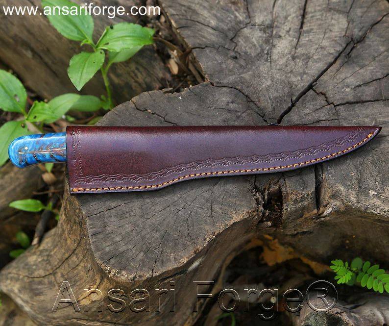 Damascus steel fish fillet knife in brown leather sheath