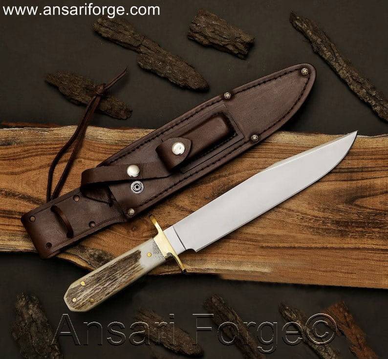 Wild West Bowie Knife with stag handle and brass hilt.