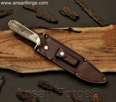Wild West Bowie Knife in genuine cowhide leather sheath.