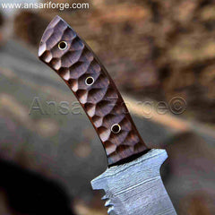 The Camper Damascus Tracker Knife, a hand-forged fixed blade knife with a walnut wood handle and a cowhide leather sheath.