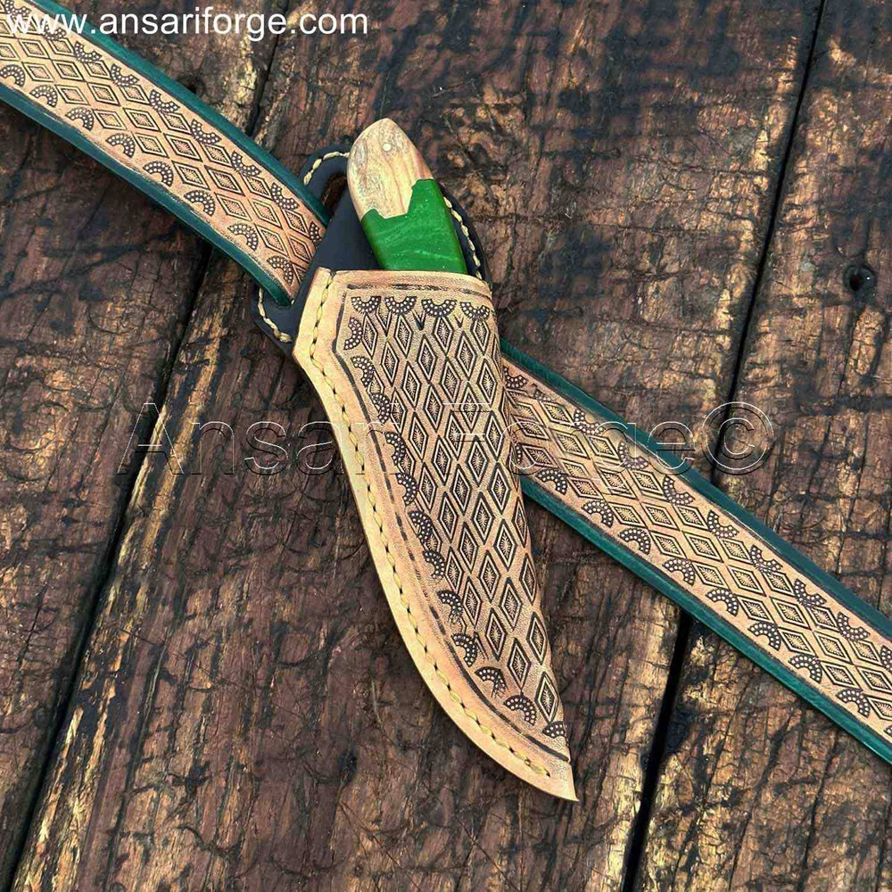 Fixed blade cowboy knife with Western-style leather sheath and belt.