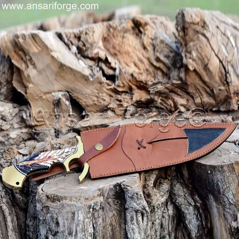Handmade Custom Bowie Knife sheathed in a hand-stitched genuine cowhide leather sheath.