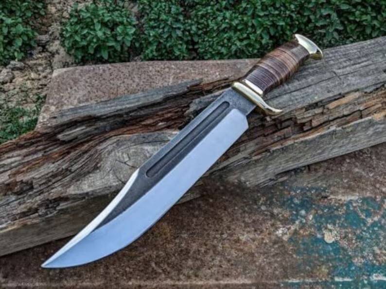 Custom made high carbon steel Bowie knife with leather sheath