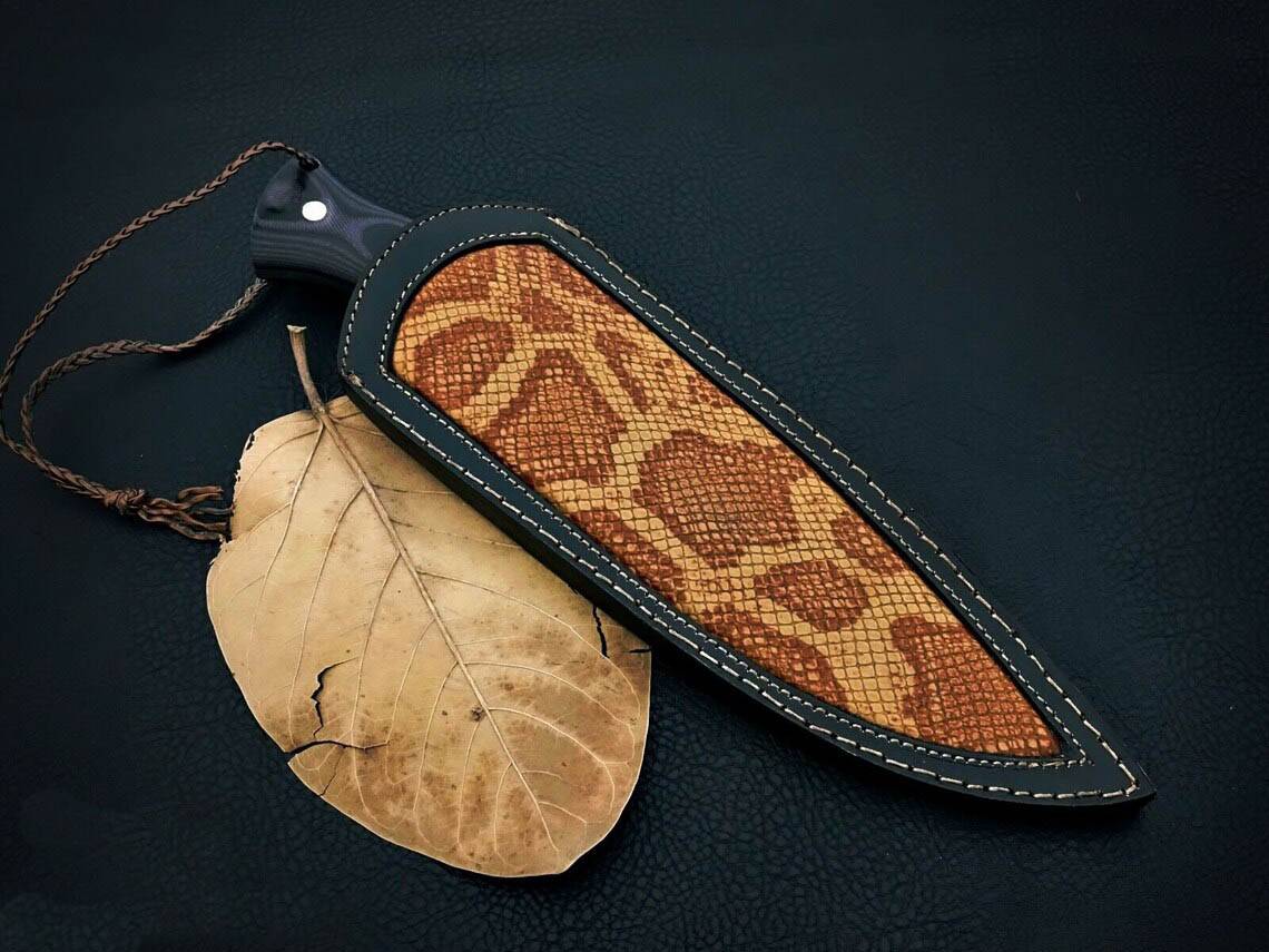 Custom handmade D2 steel hunting knife with leather sheath