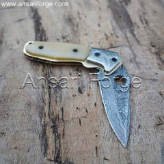 Damascus pocket knife bone handle