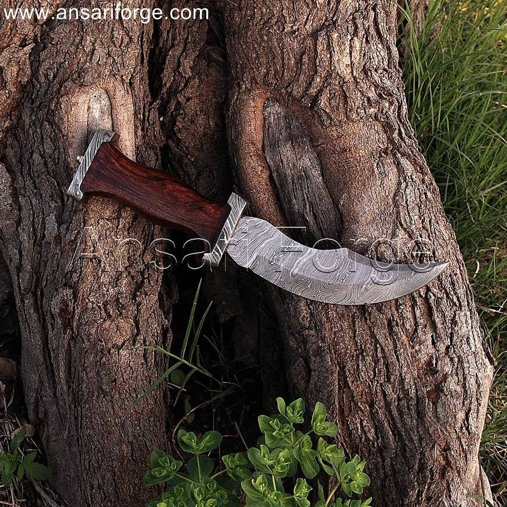 Pirate dagger with Damascus steel blade, walnut wood handle, and leather sheath