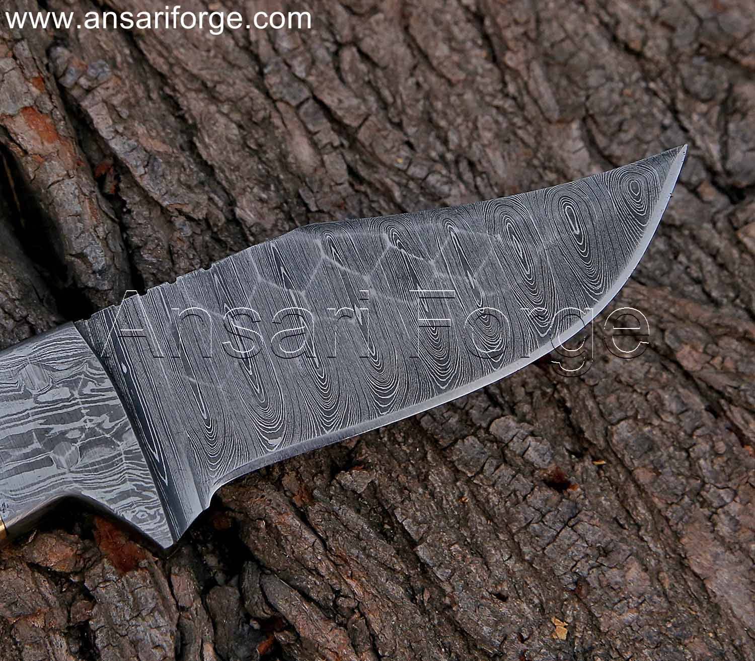 Hand forged Damascus steel blade of best hunting knife