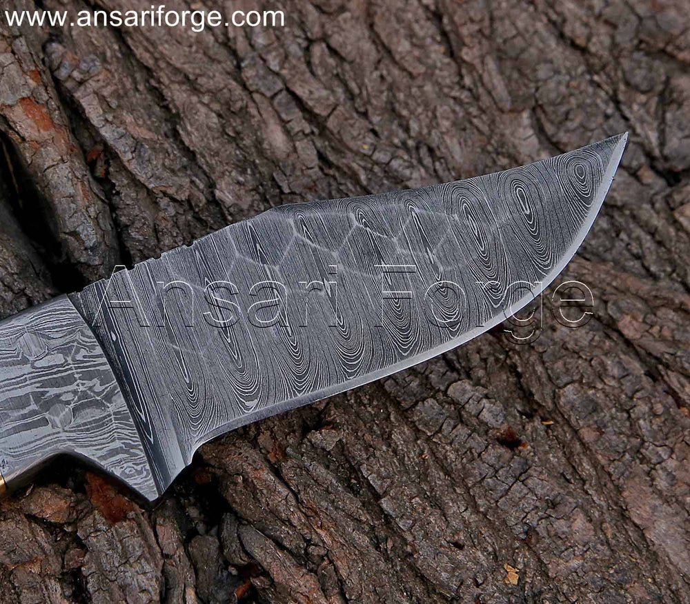 Hand forged Damascus steel blade of best hunting knife