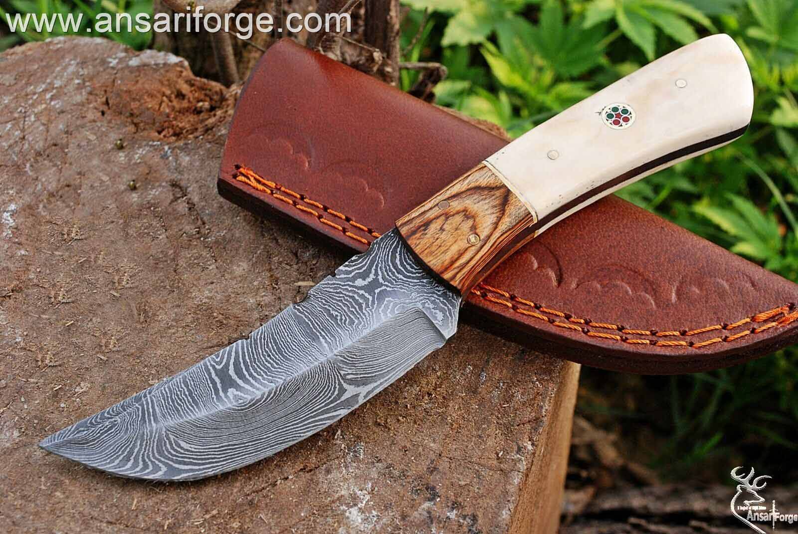 Damascus steel hunting knife with leather sheath