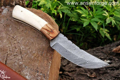 Damascus steel hunting knife with leather sheath