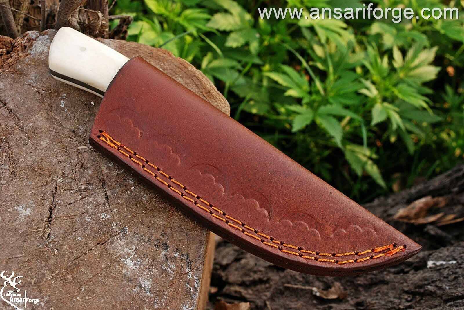 Damascus steel hunting knife with leather sheath