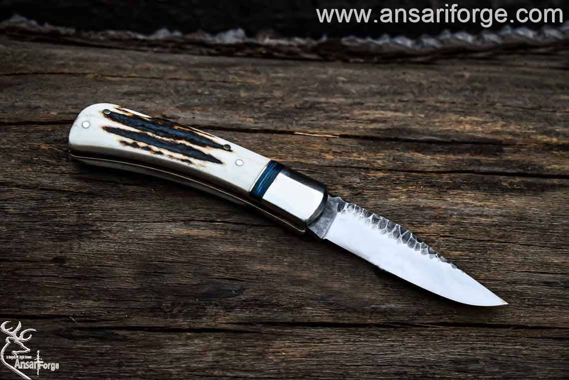 Stag antler handle folding knife on sale.
