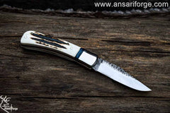 Stag antler handle folding knife on sale.