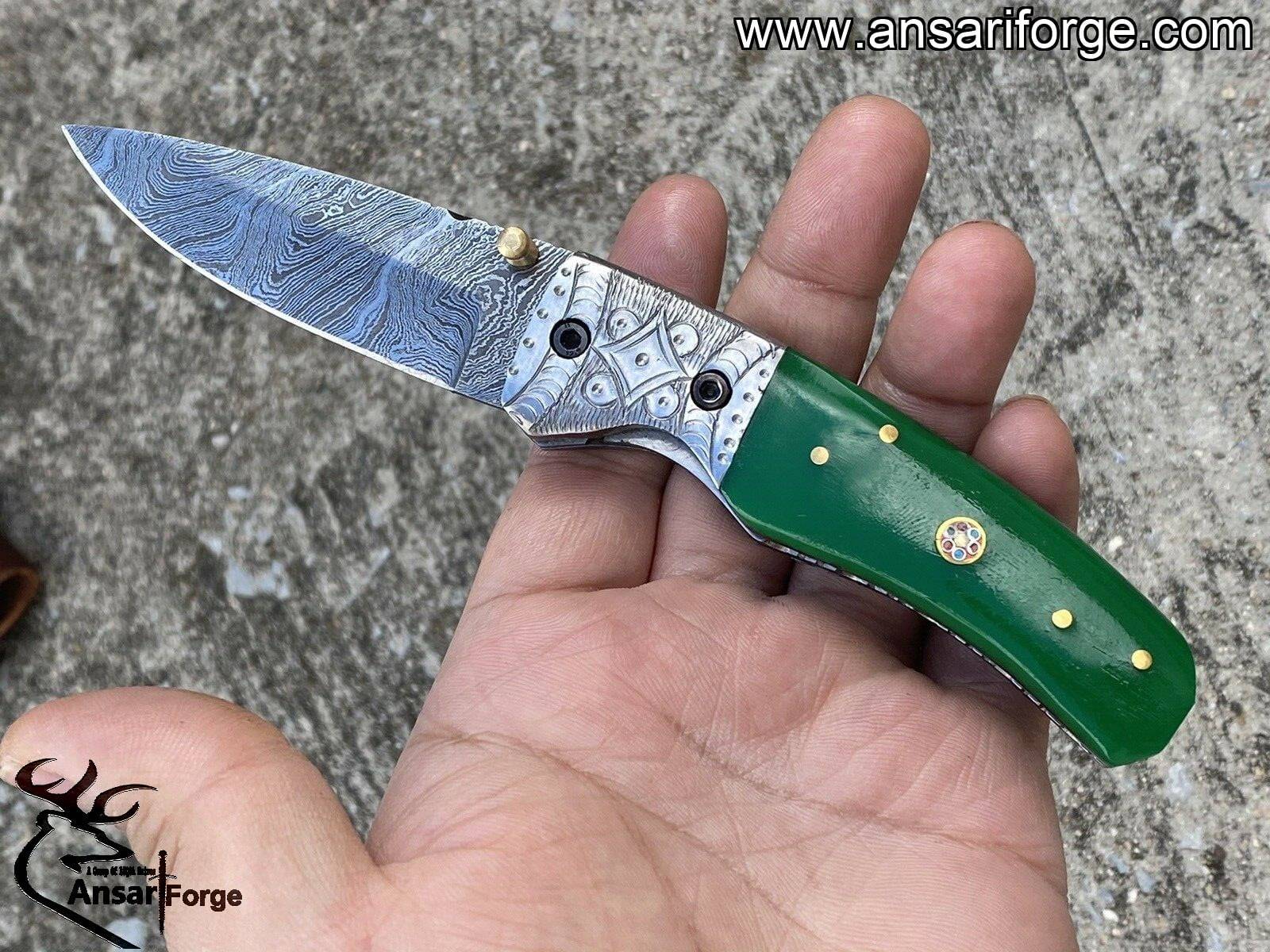 Damascus steel engraved pocket knife