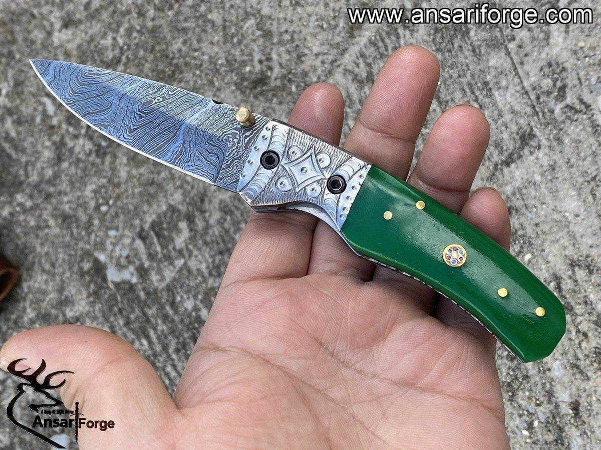 Damascus steel engraved pocket knife