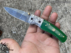 Damascus steel engraved pocket knife