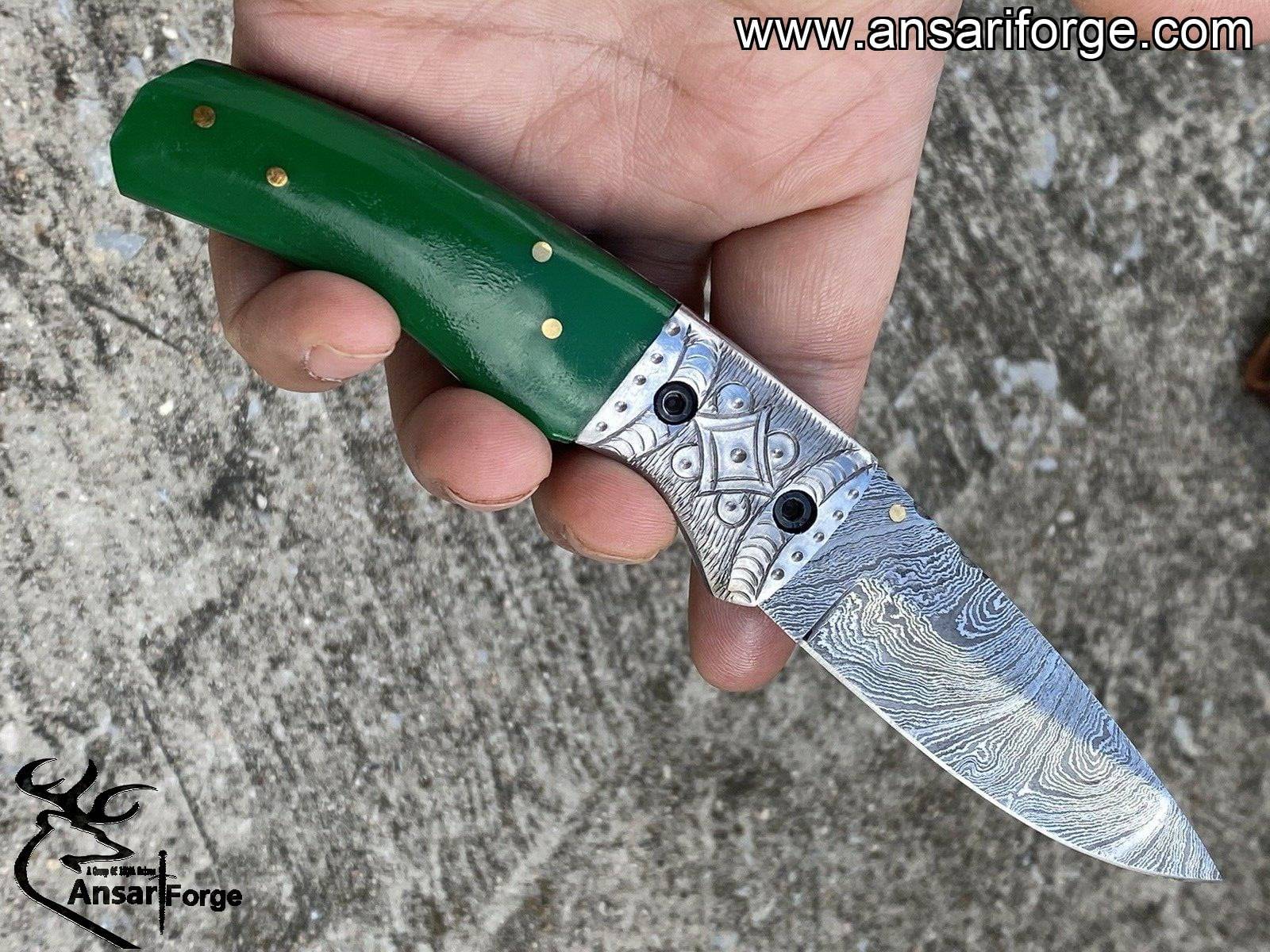 Damascus steel engraved pocket knife