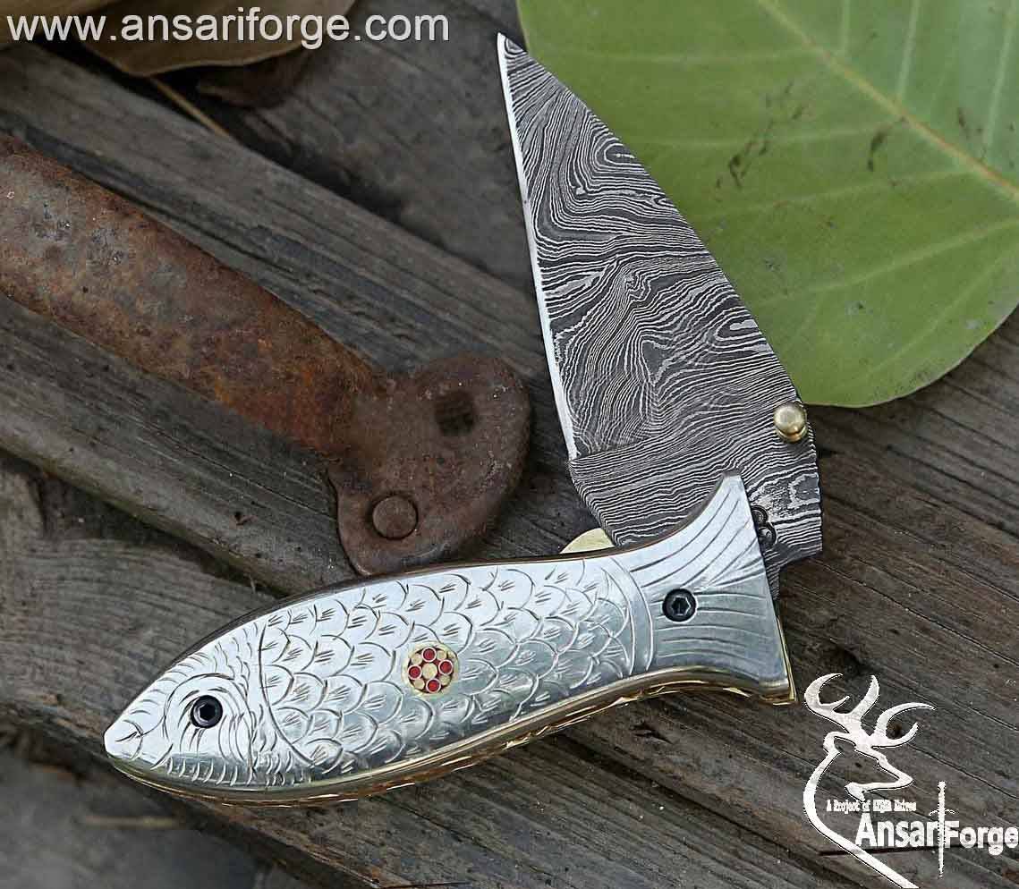 Custom made Damascus steel fish folding knife