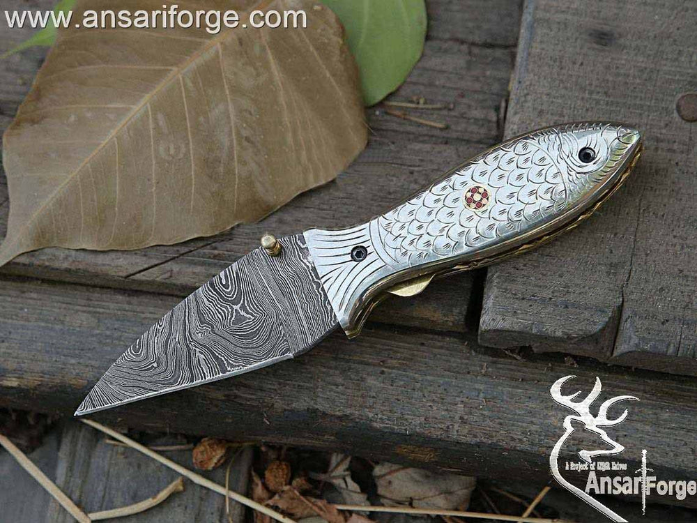 Custom made Damascus steel fish folding knife .Damascus steel 1095 & 15n20 hand forged twisted folding blade with 58 - 60 HRC hardness ,