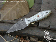 Custom made Damascus steel fish folding knife .Damascus steel 1095 & 15n20 hand forged twisted folding blade with 58 - 60 HRC hardness ,
