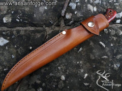 Leather sheath for Damascus fillet knife.