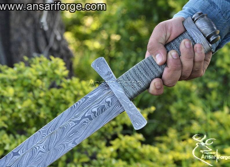 Hand-forged Viking sword crafted by master smiths at Ansari Forge.
