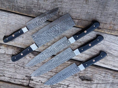 Hand forged Damascus kitchen knife set with leather roll bag.