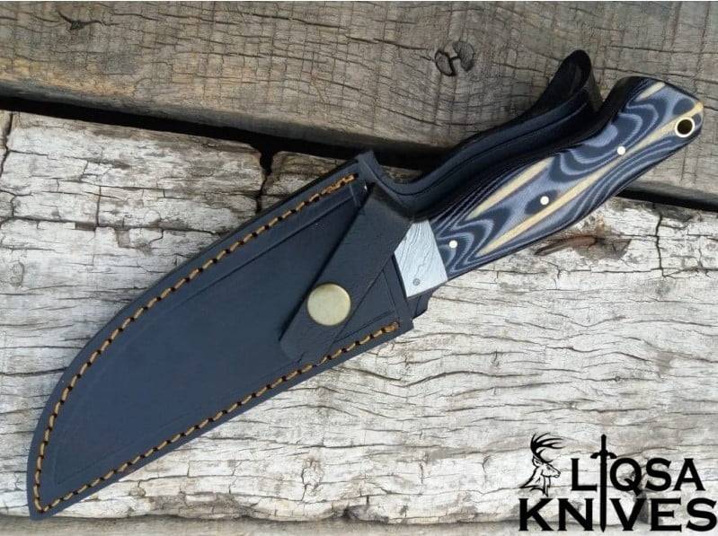 Outdoor Hunting Knife with Full Tang Damascus Blade and Leather Sheath.