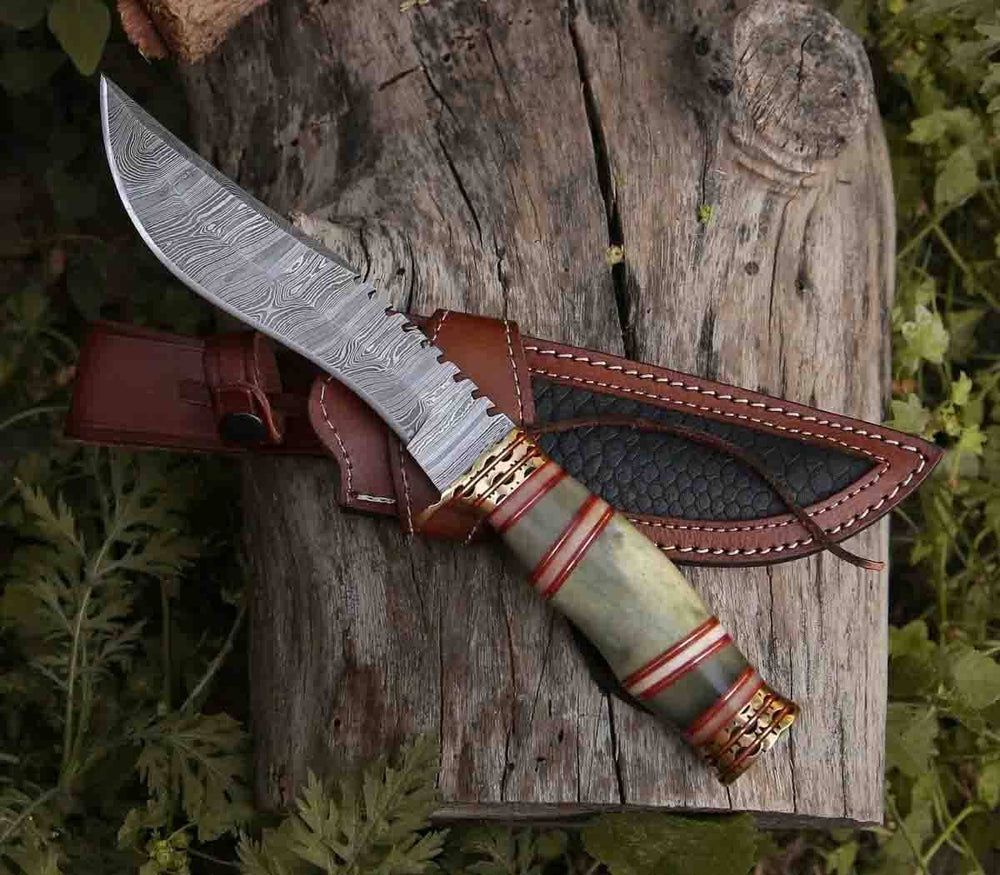 Razor's Edge 13-inch damascus steel hunting knife with bone handle, brass hilt, and leather sheath.