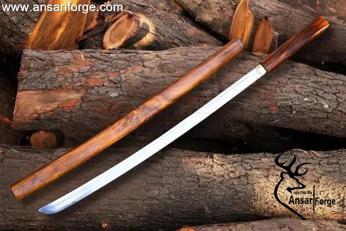 Close-up of mirror polished 5160 High Carbon Steel tanto blade with single bevel.