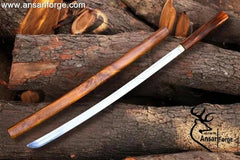Close-up of mirror polished 5160 High Carbon Steel tanto blade with single bevel.