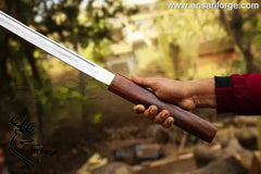 The 30-inch 5160 steel blade drawn from the rosewood scabbard, showcasing the full spine thickness.