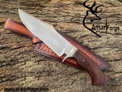 Handmade Hunting Bowie Knife displayed with its genuine cowhide leather sheath, highlighting the knife's elegant design and protective features.