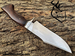 Detailed image of the rosewood handle of the Handmade Hunting Bowie Knife, featuring a stainless steel finger guard.