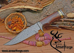Handmade Damascus Knife with intricate rain drop pattern, walnut wood handle, and Damascus steel guard and pommel.
