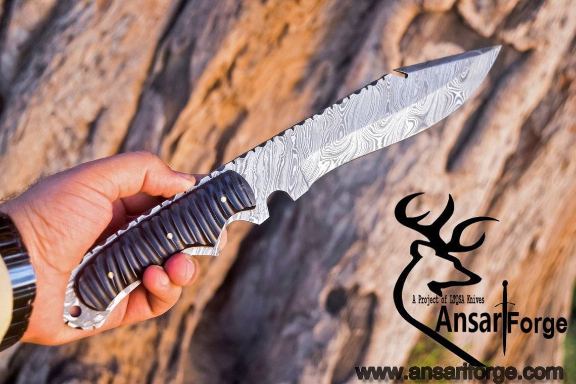 Handmade Damascus Steel Hunting Knife - Full tang Bowie with 12-inch overall length, featuring a 7-inch drop point blade and buffalo horn handle. Crafted by Ansari Forge.