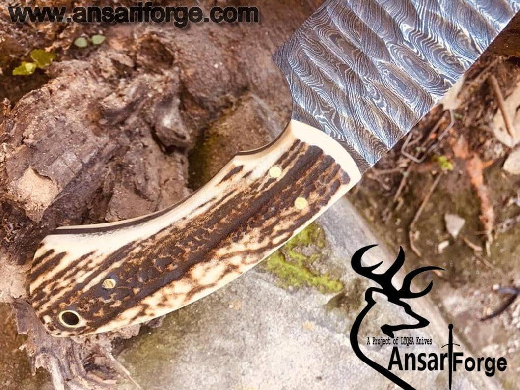 Damascus steel flint knapped hunting knife with stag antler handle