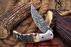 Custom made Damascus steel Pocket knife sheep horn handle