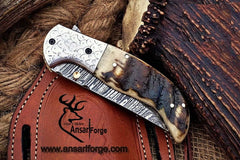 Custom made Damascus steel Pocket knife sheep horn handle