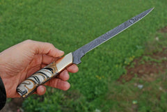 Damascus steel fillet knife with leather sheath