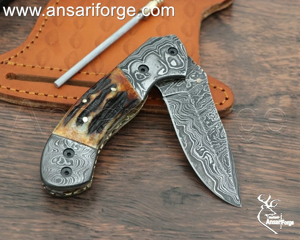 Close-up of Hand-Forged 580 Layer Damascus Steel Folding Blade with Liner Lock